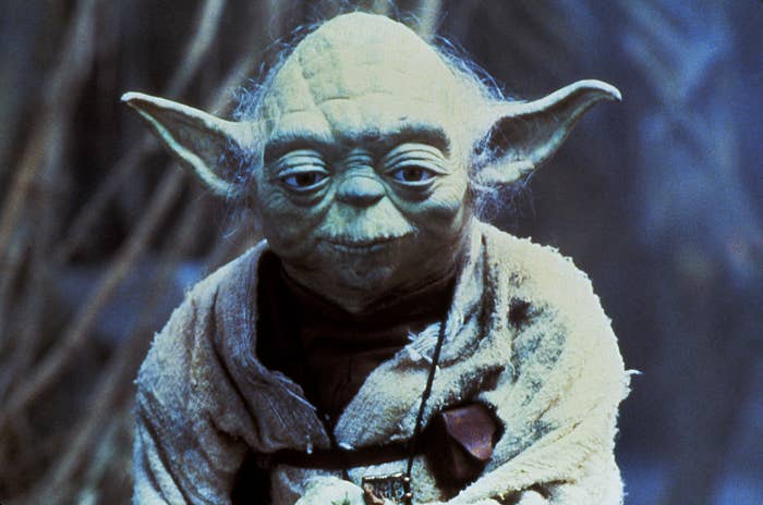 Character Yoda from Star Wars, wearing his traditional Jedi robes