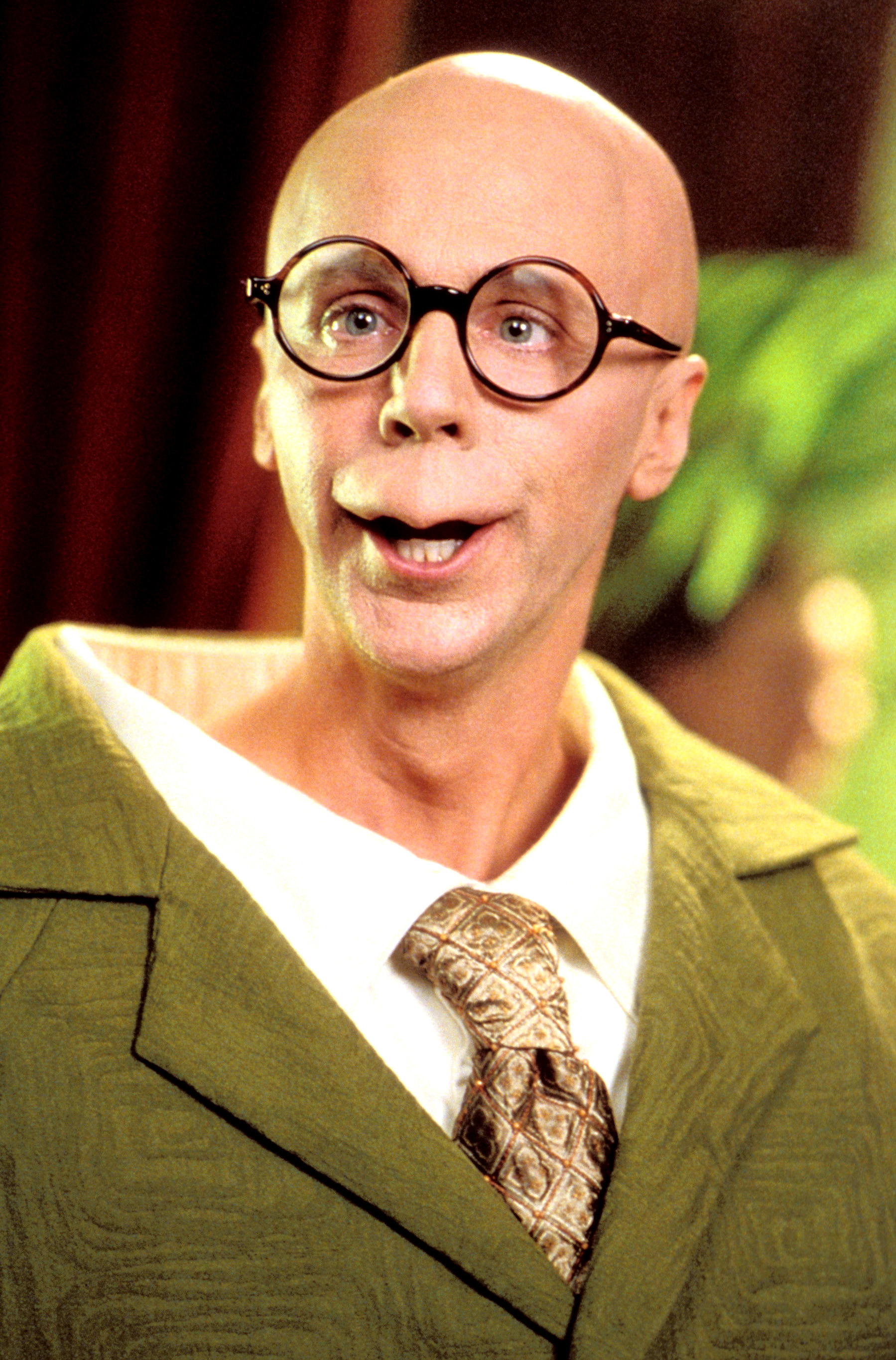 Character Dr. Evil from Austin Powers films, wearing a gray suit and black-rimmed glasses