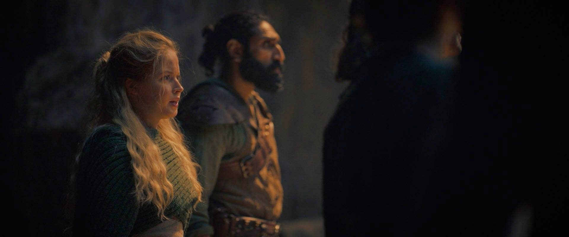 Ellie Bamber and Amar Chadha-Patel in medieval costumes in a scene from the show