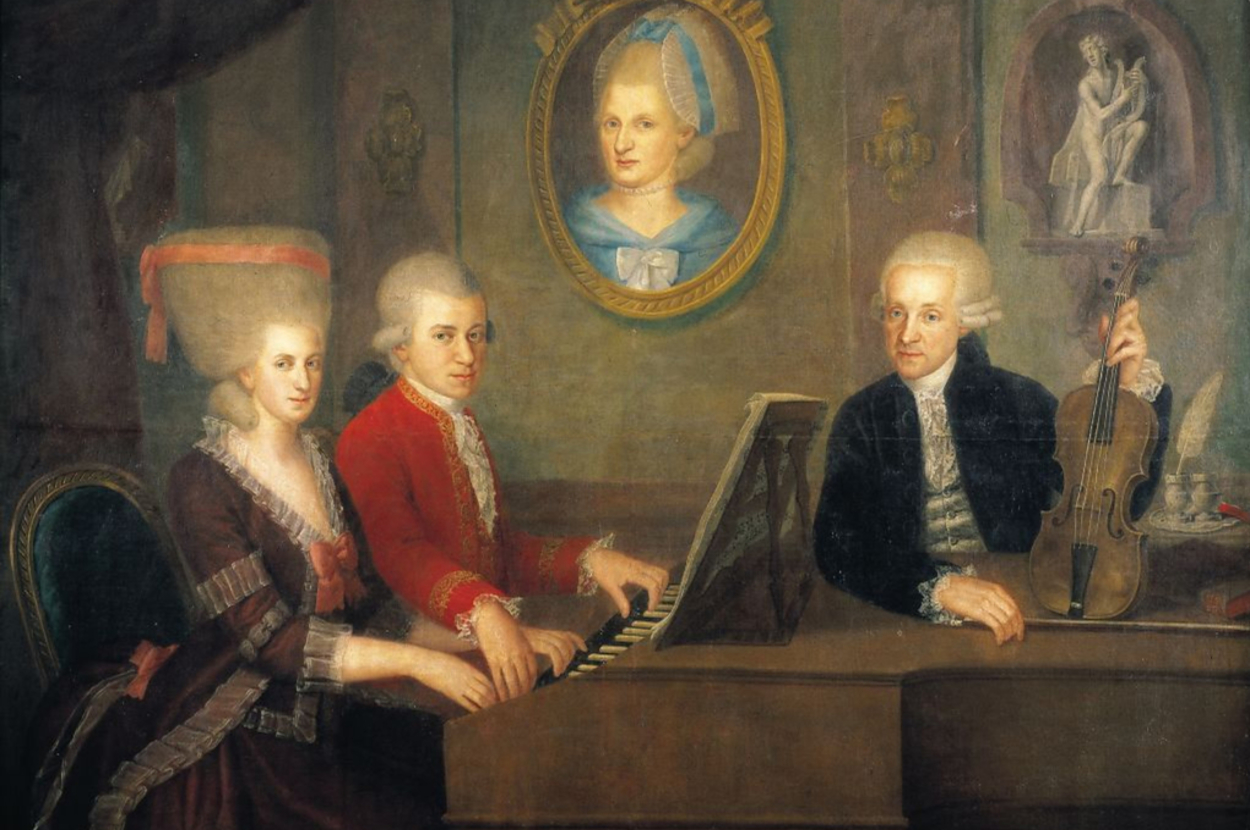Painting of the Mozart family: Maria Anna, Wolfgang, and Leopold at the piano, with a portrait of Anna Maria