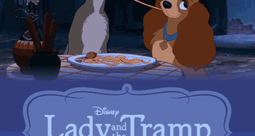 Lady and the Tramp sharing spaghetti in a romantic scene from the animated film