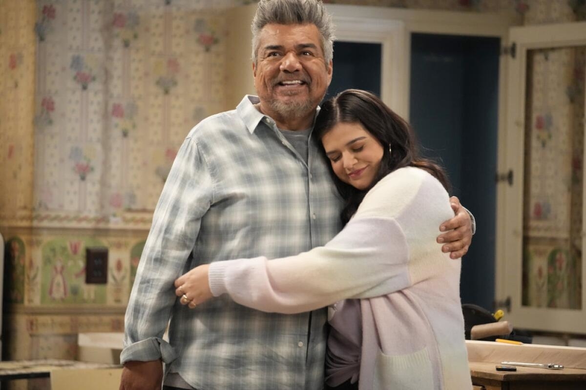 George Lopez and Mayan Lopez hugging in a scene from their TV show