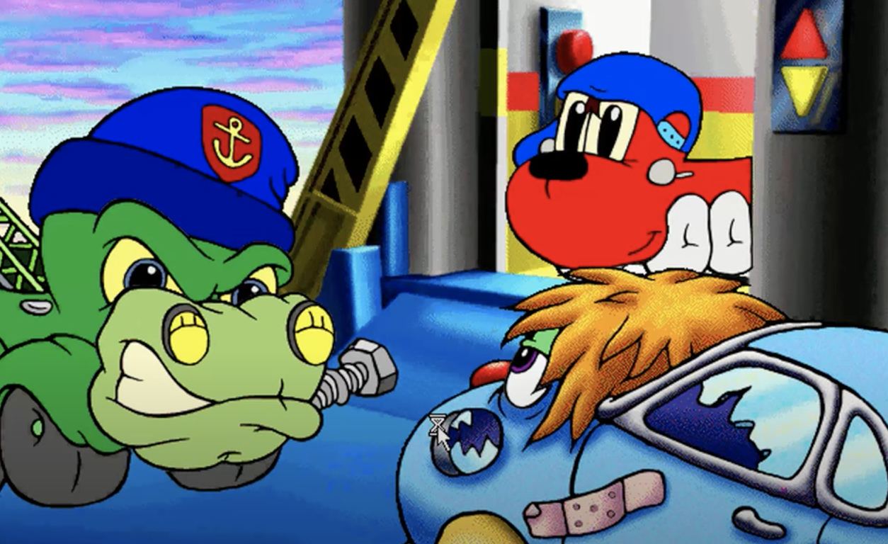 Animated characters: a green tow truck in a sailor cap, a blue creature with a red hat, and a boy with orange hair, all in a vehicle-themed setting