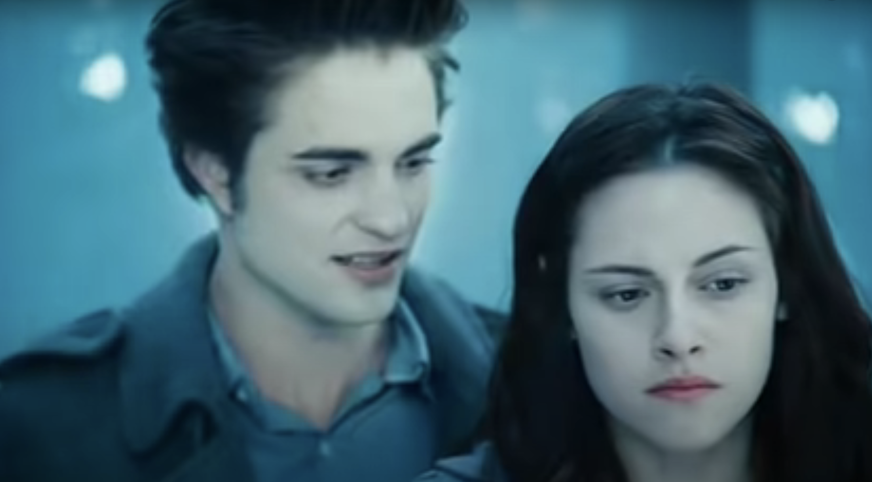 Edward Cullen and Bella Swan in a close-up from Twilight, showing intense expressions