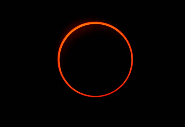 Thin glowing ring against a dark background