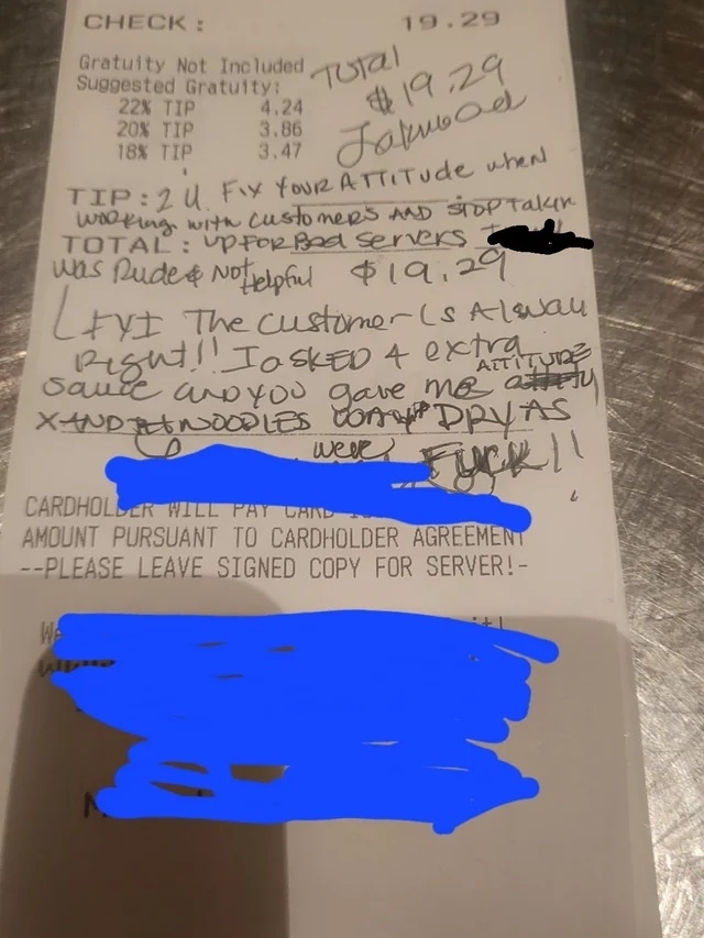 Receipt with handwritten note expressing customer dissatisfaction over service and gratuity policy, resulting in no tip left