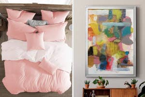 A bedroom scene with a crumpled pink duvet on a bed to the left and a framed abstract painting on the right wall