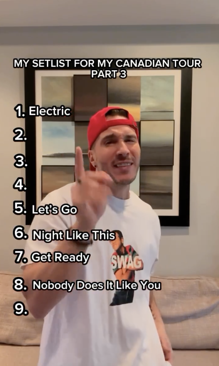 Man in cap gesturing number one, with a tour setlist text overlay
