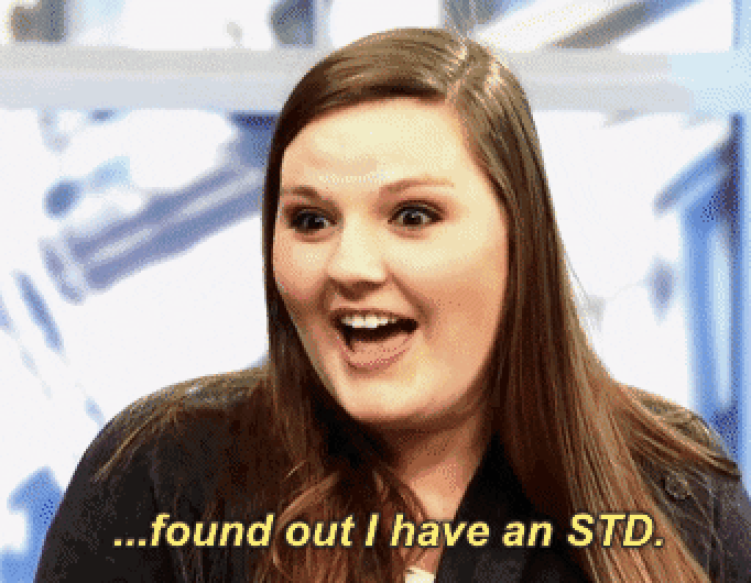 Woman appears surprised on a talk show with subtitle text revealing a personal health disclosure