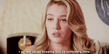Petra from Jane the Virgin, expressing smug satisfaction, dialogue overlay: &quot;I do feel better knowing you&#x27;ve suffered a little.&quot;
