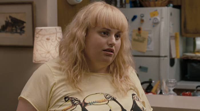 Scene with Fat Amy from Pitch Perfect wearing a graphic T-shirt