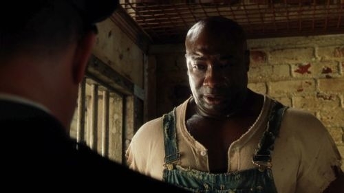 Two characters in a scene, one facing away, the other showing a concerned expression