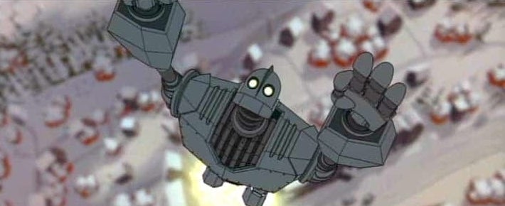 Iron Giant character is shown falling with outstretched arms amidst debris