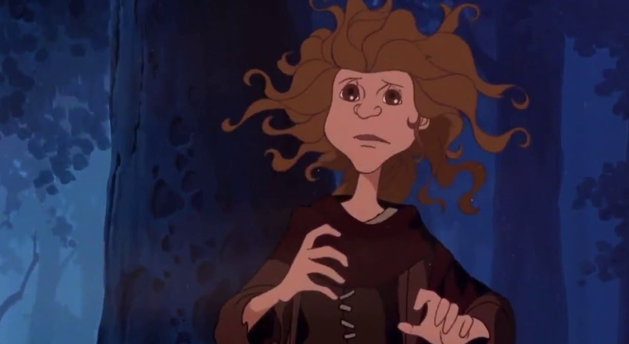 Animated character Princess Merida looking worried in a forest scene