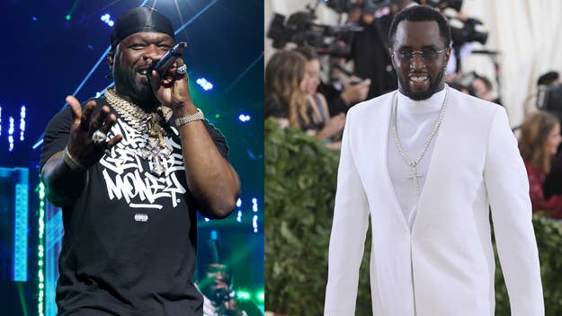 50 cent on stage with microphone, diddy in elegant white suit at event