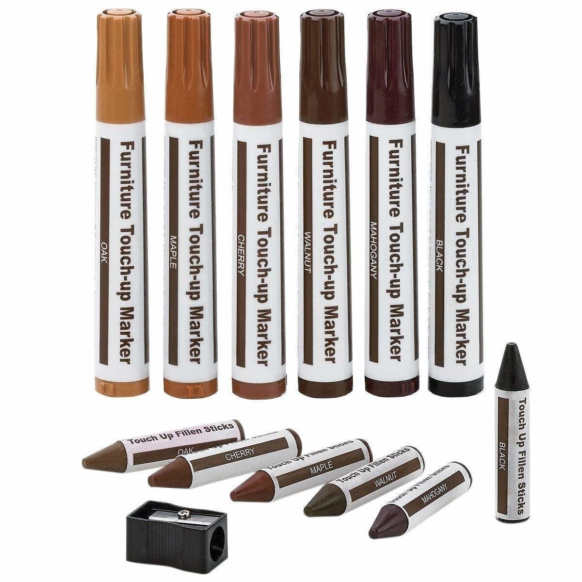 A set of furniture touch-up markers and filler sticks for wood repair