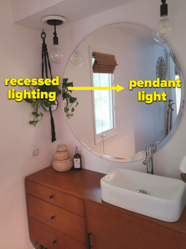 reviewer&#x27;s bathroom using the kit on recessed lighting to convert it to pendants