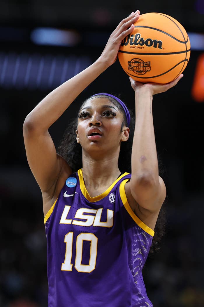 LSU basketball player in jersey number 10 takes free throw shot