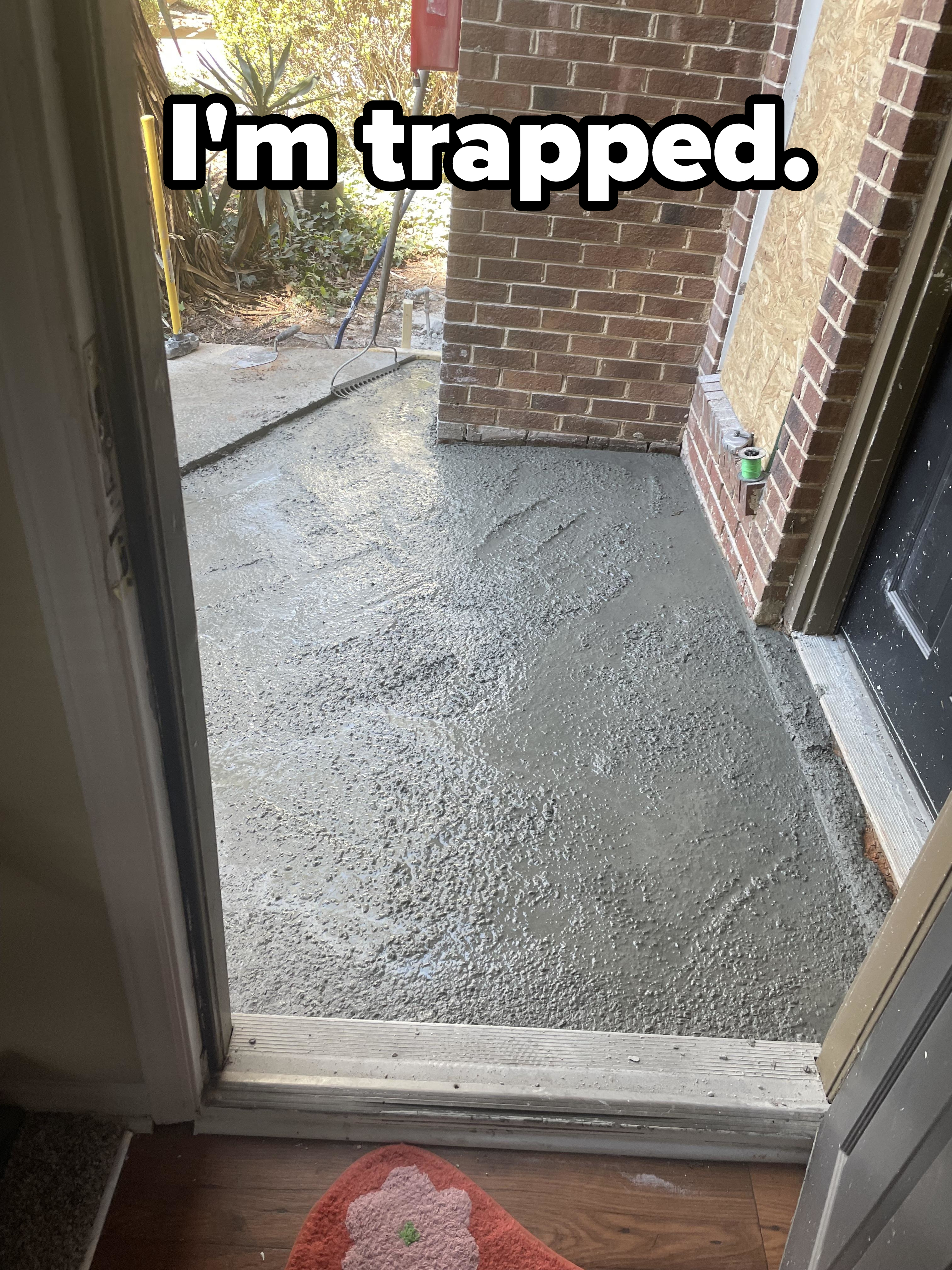 Freshly poured concrete on a residential doorway step