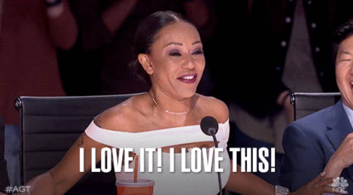 Mel B smiling and clapping in excitement on America&#x27;s Got Talent. Text on image: &quot;I LOVE IT! I LOVE THIS!&quot;