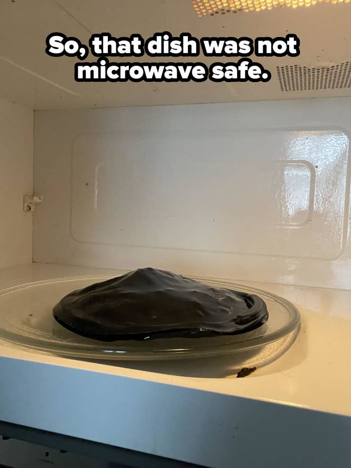Melted plastic container inside a microwave