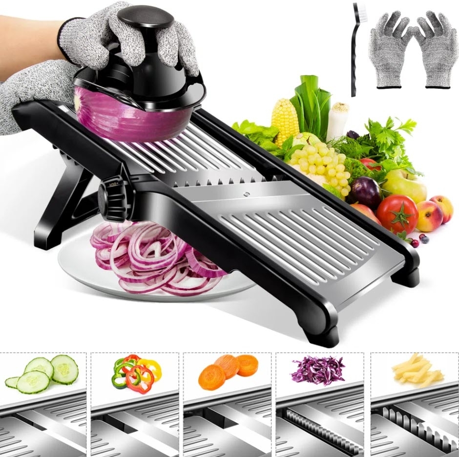 Hands using a mandoline slicer to cut vegetables with safety gloves on and various sliced vegetables displayed around