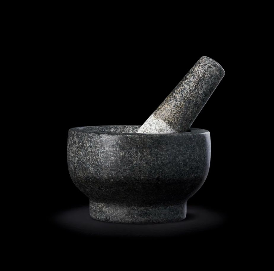 Mortar and pestle on a black background