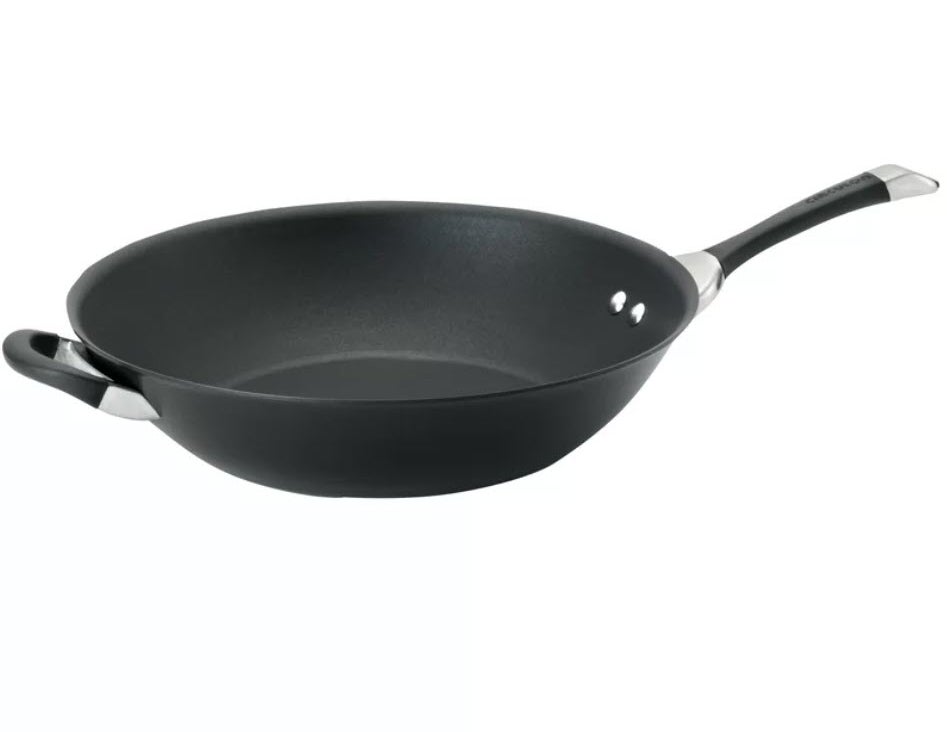 Non-stick frying pan with a long handle and a small loop on the opposite side