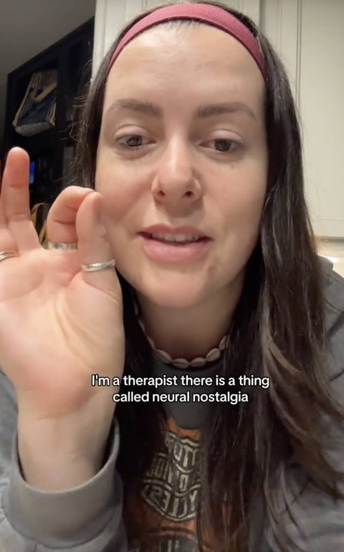 Nikki gestures with hand near face, text overlay: therapist discusses neural nostalgia