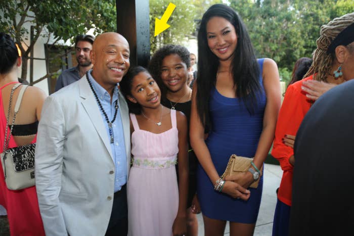 Russell Simmons, Ming Lee Simmons, Aoki Lee Simmons, and Kimora Lee Simmons pose together at an event