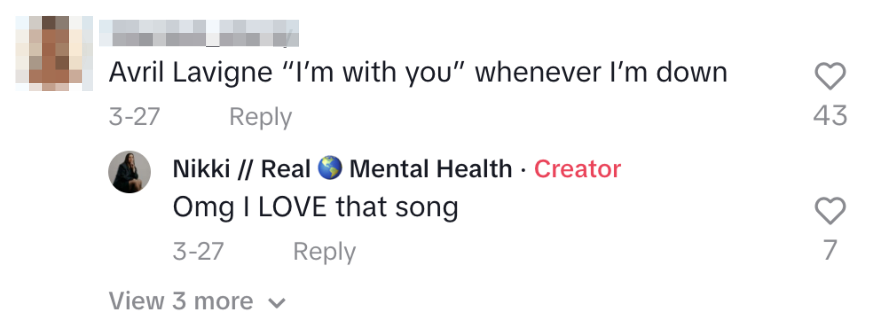 Two users&#x27; comments on a social media post discussing a song by Avril Lavigne
