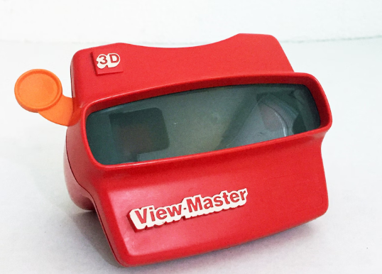 Red View-Master toy, a 3D image viewer, placed against a white background