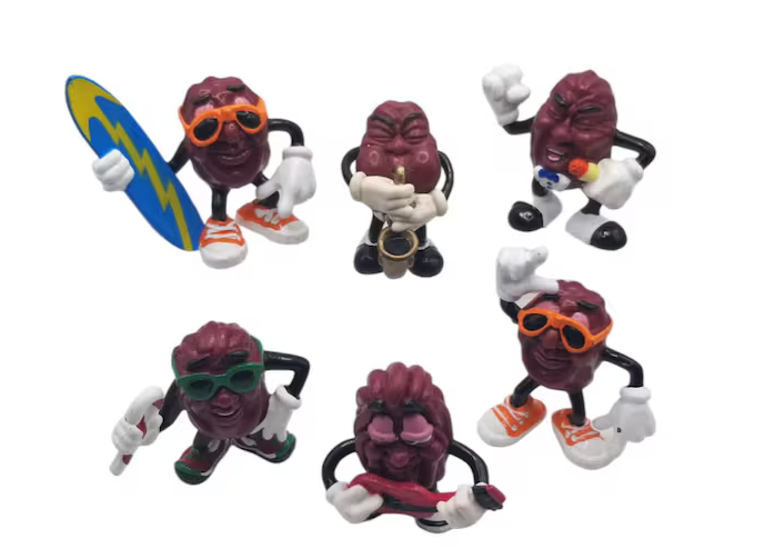 Six California Raisins figures in different poses related to sports activities