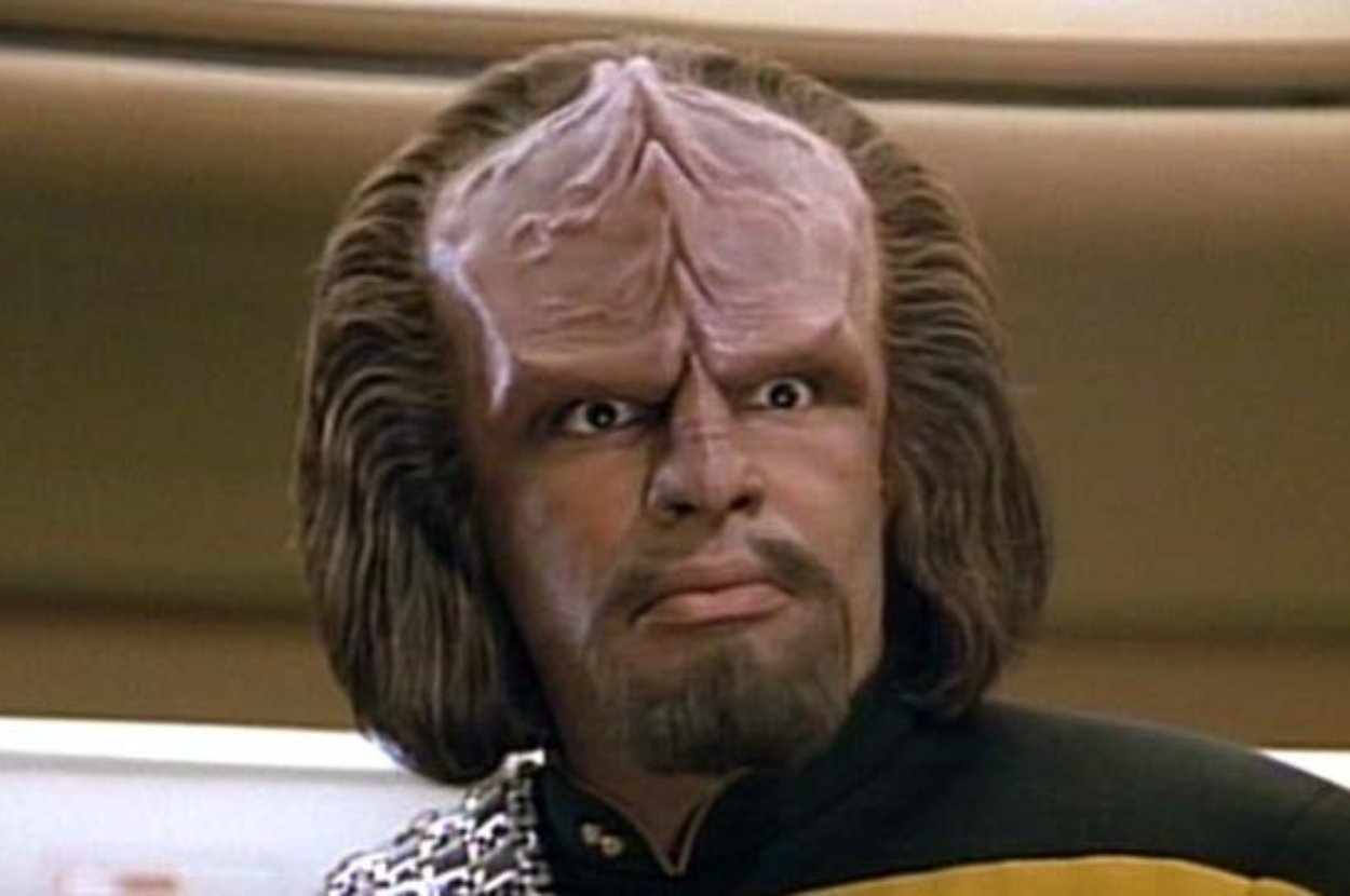 Worf from Star Trek in uniform with a concerned expression