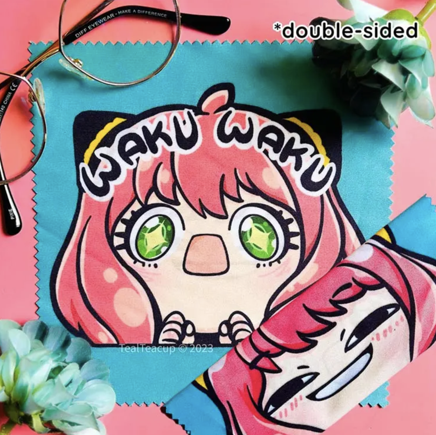 Double-sided anime-style character mouse pad with a &#x27;WAKU WAKU&#x27; design, flowers, and glasses around it