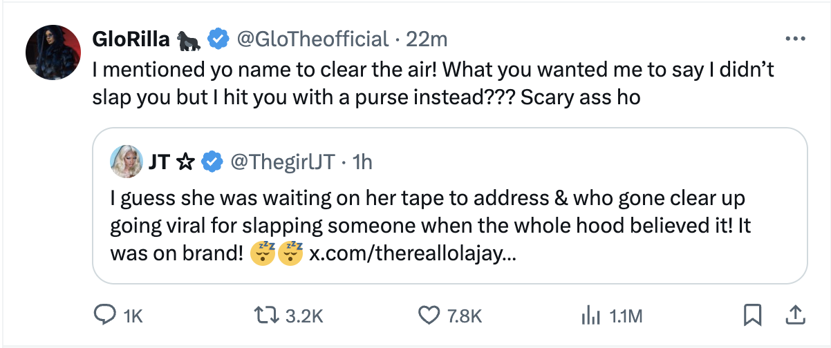 Twitter exchange between GloRilla and JT with GloRilla refuting claims of an altercation by mentioning an online article link