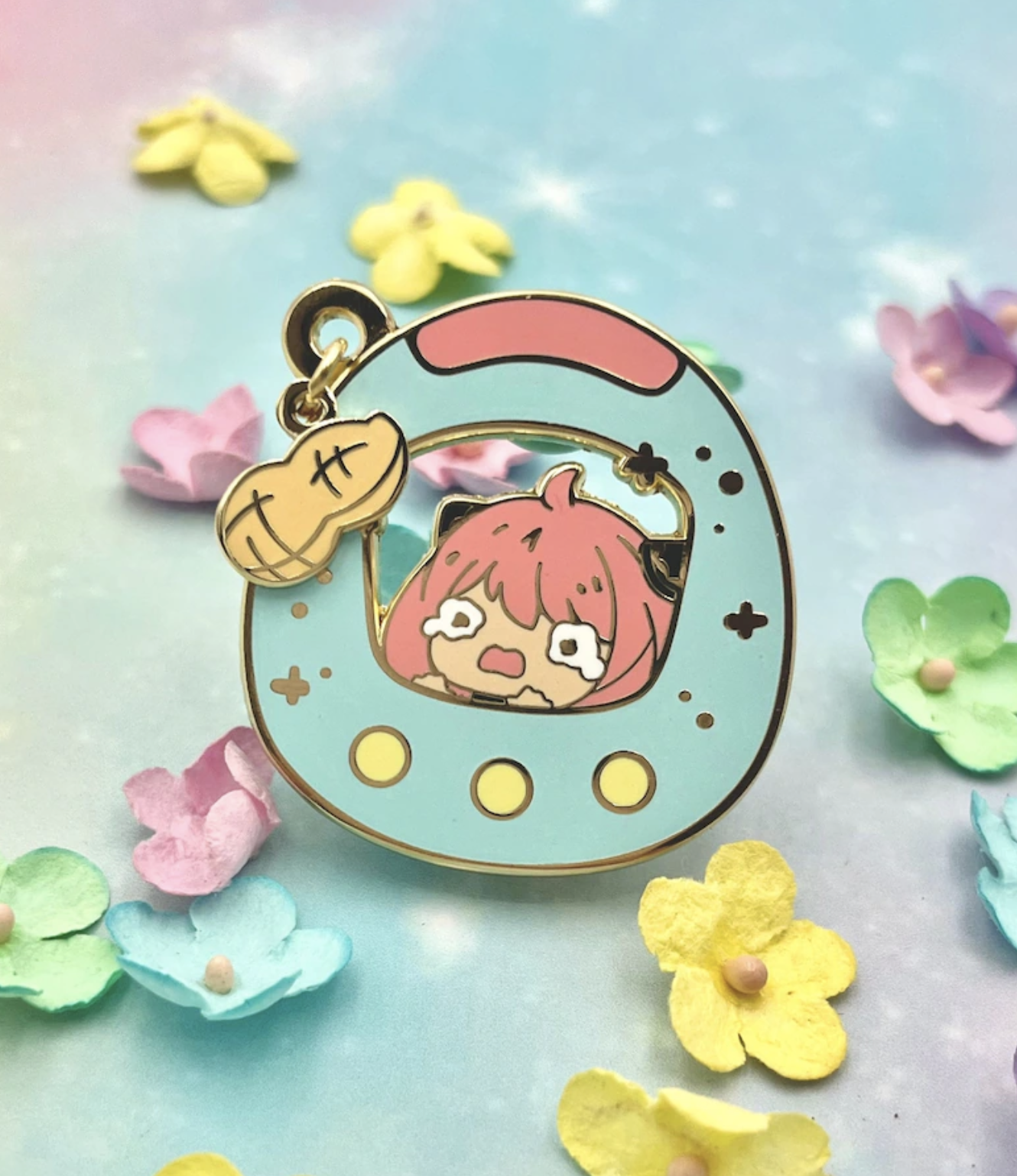 Enamel pin featuring an animated character with pink hair inside a spaceship, surrounded by flower confetti