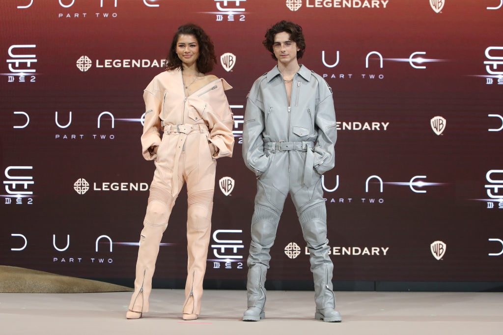 Zendaya and Timothée Chalamet in jumpsuits at a &quot;Dune: Part Two&quot; premiere