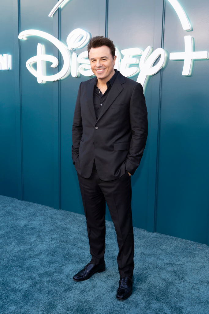 Seth MacFarlane in a black suit and shoes at a Disney+ event