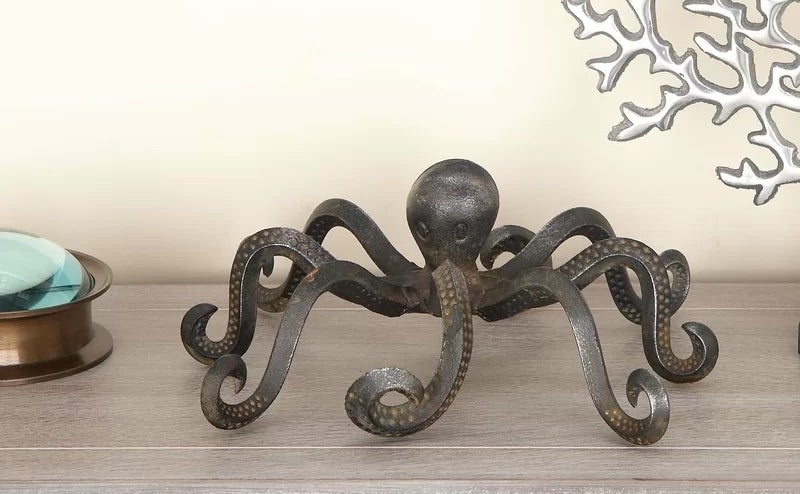 Octopus sculpture on a wooden surface