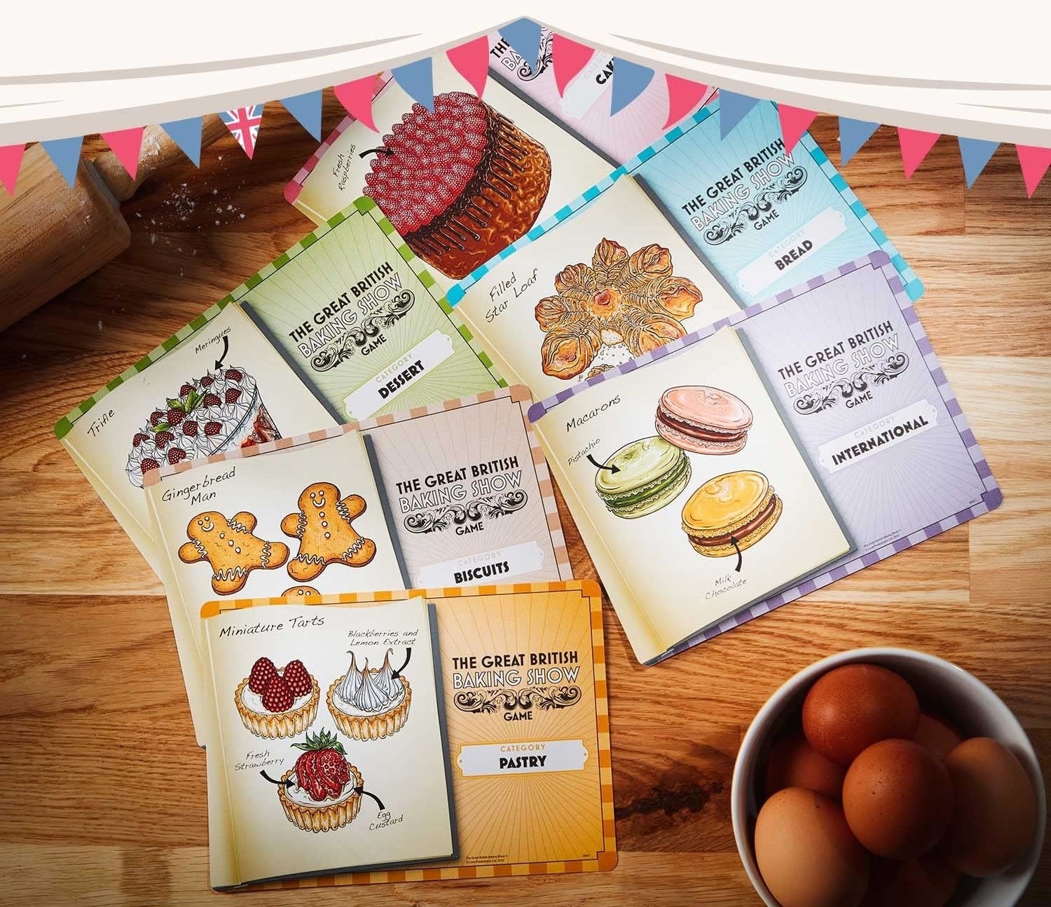 A variety of illustrated recipe cards displayed on a wooden surface with the title &quot;Delicious Illustrations&quot; above