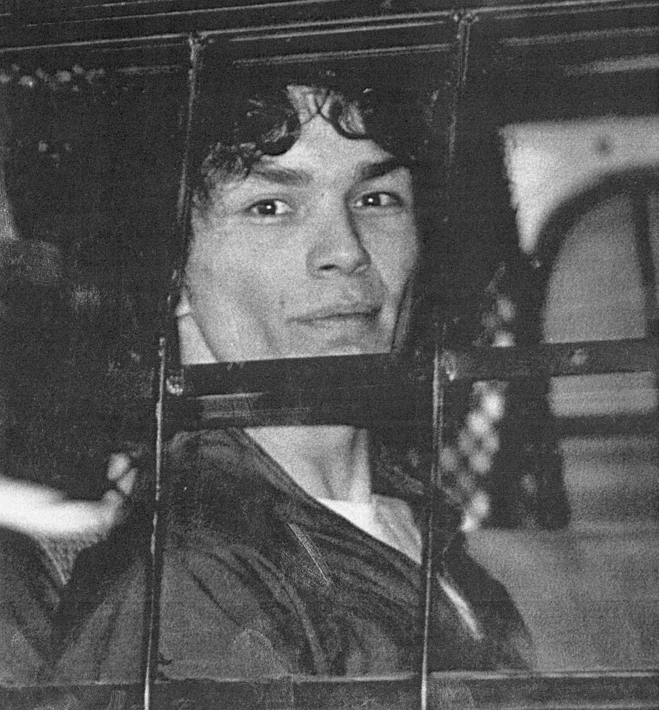 Ramirez smiling inside a vehicle behind a patterned partition