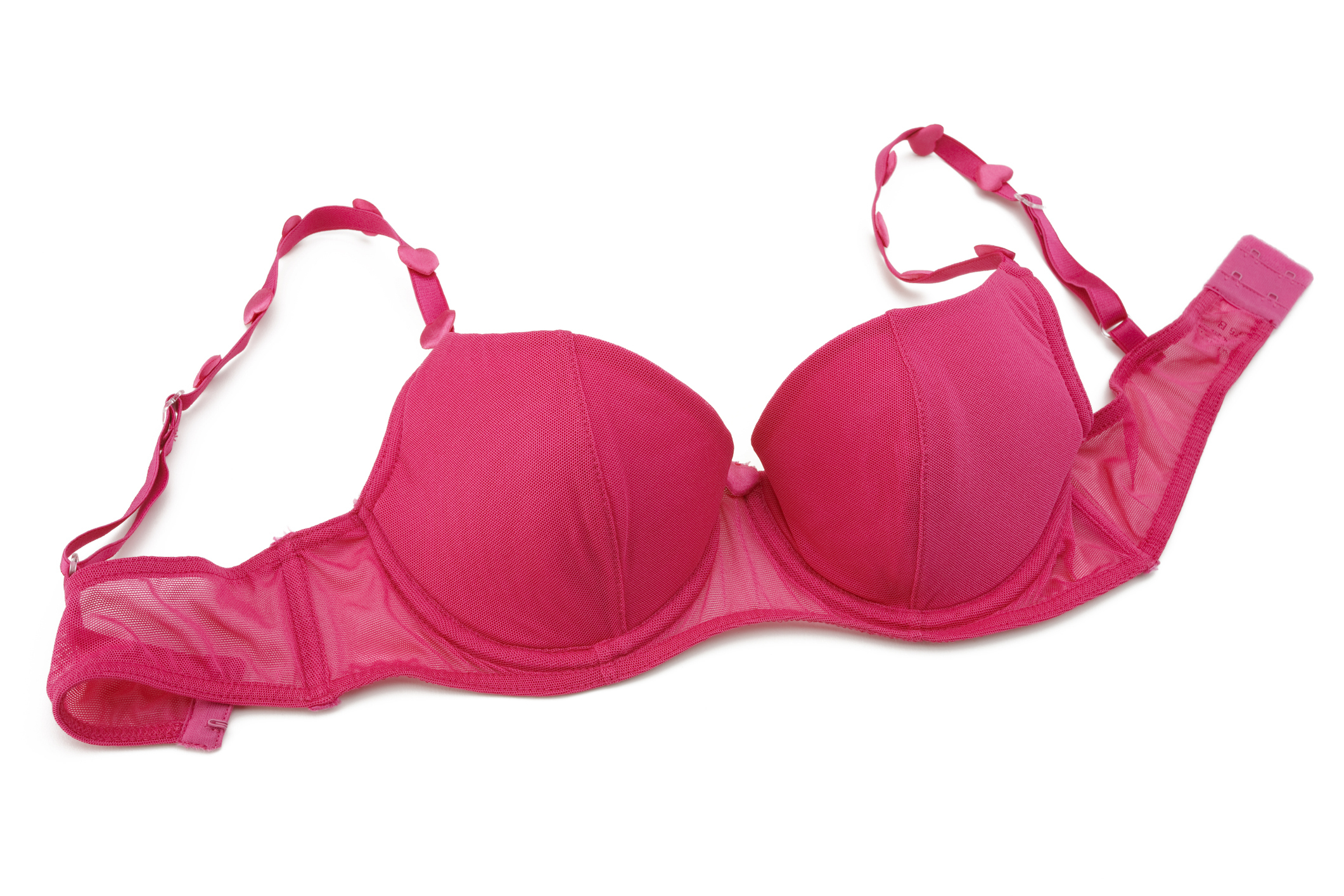 A pink bra lying flat on a surface