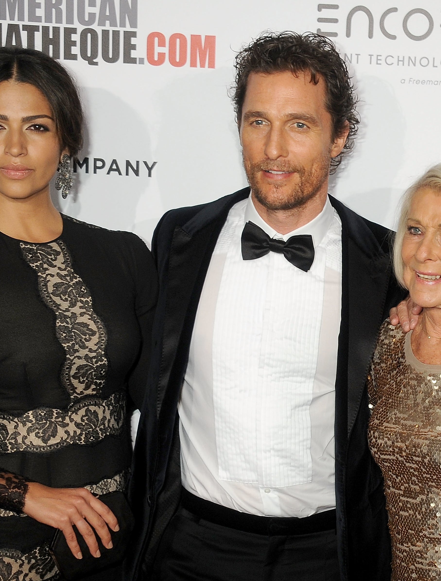 Matthew McConaughey and his mom posing together at an event