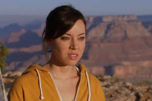 April from "Parks and Rec" looking confused at the Grand Canyon.