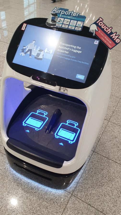 Interactive kiosk at an airport displaying baggage transport service information