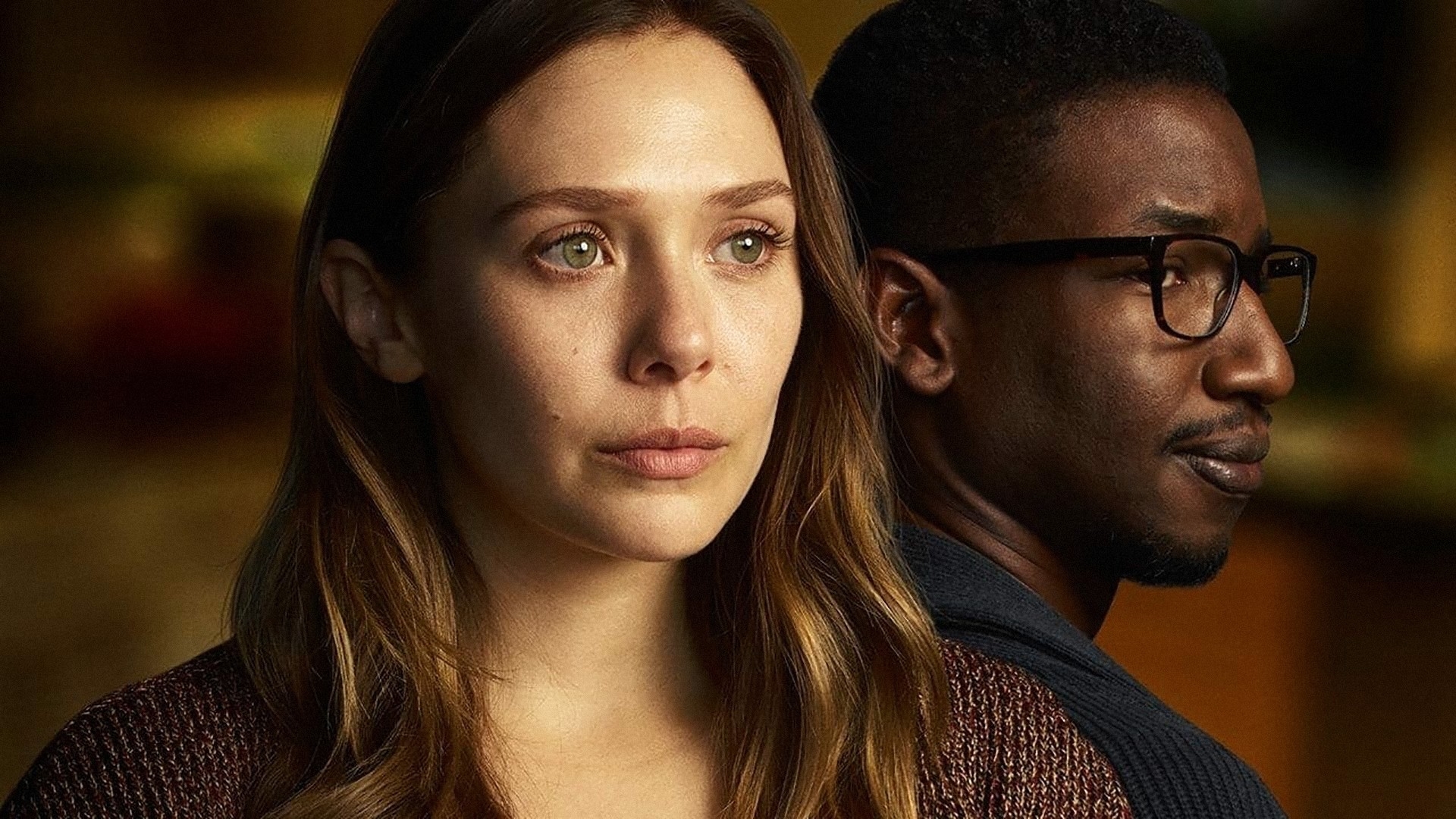 Elizabeth Olsen and Mamoudou Athie in a still from their TV series