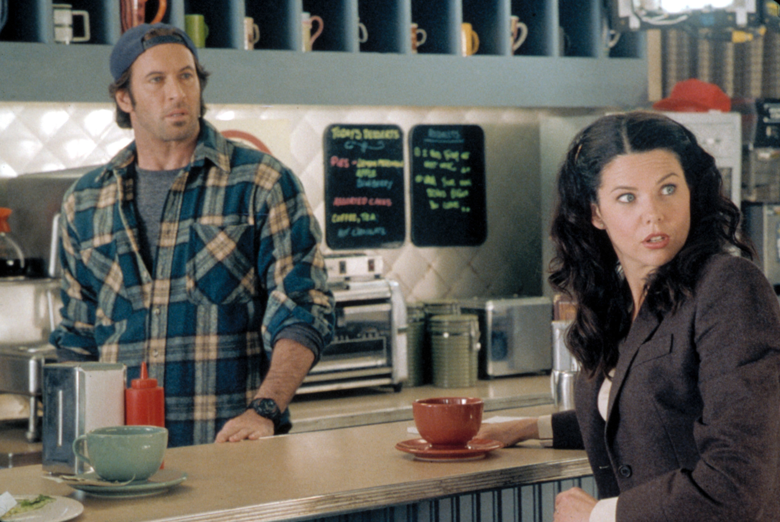 Luke Danes and Lorelai Gilmore in a scene at Luke’s Diner from the TV show &quot;Gilmore Girls.&quot;