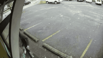 a circular blade moving fast across a parking lot