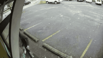 a circular blade moving fast across a parking lot
